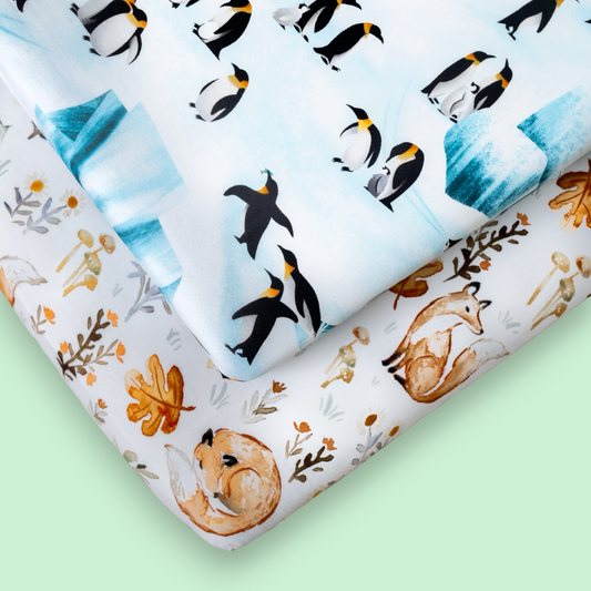 2-Pack StretchLuxe Fitted Crib Sheets (Emperors on Ice, Woodland Foxes)